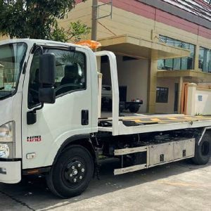 Xe tải Isuzu NPR 400 cứu hộ sàn trượt chở ô tô